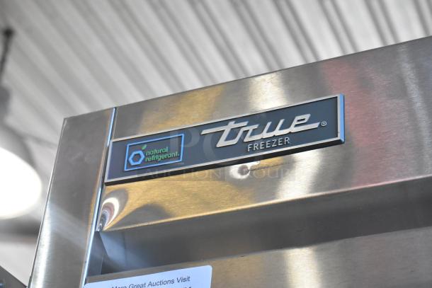 2019 True T-49F-HC freezer, stainless steel, 2-door, commercial casters, "natural refrigerant" label, 115V, 1-phase.