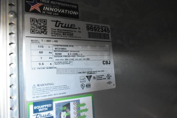 2019 True T-49F-HC commercial freezer, dual doors, on casters. Label shows 115 volts, 1 phase, R290 refrigerant.