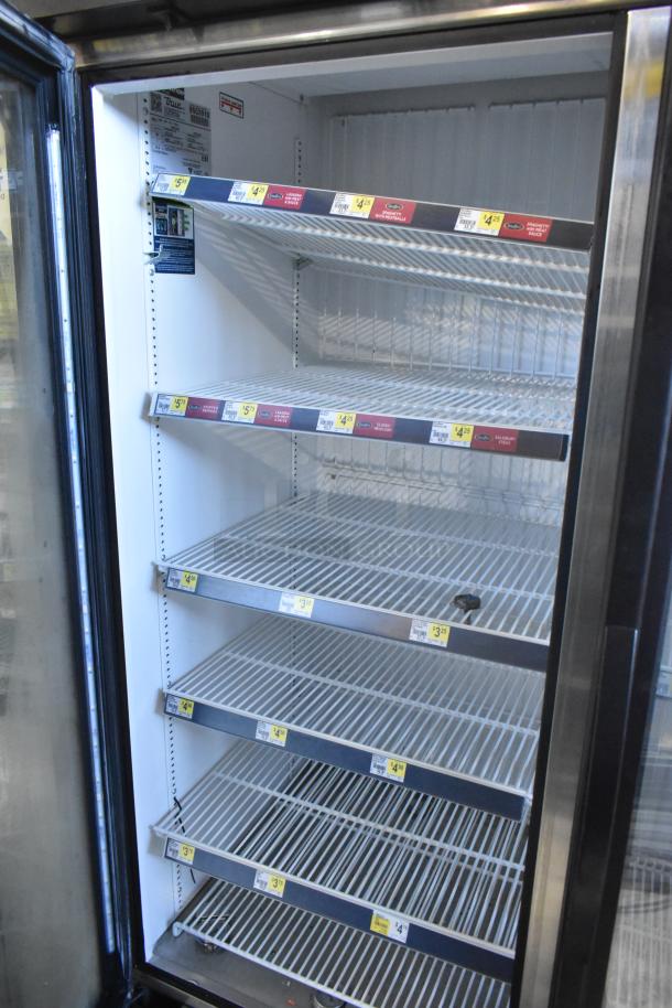 2019 True GDM-49F-HC cooler, 2-door reach-in design, multiple shelves, commercial use, 115 volts, excellent condition.