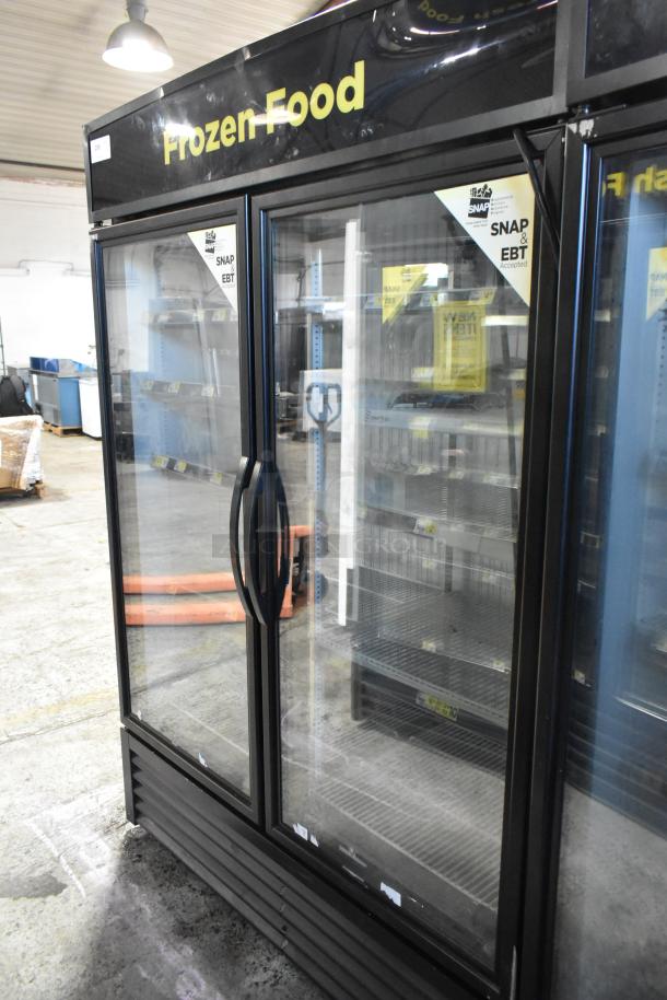 2019 True GDM-49F-HC commercial 2-door freezer, "Frozen Food" top sign, glass doors, EBT accepted stickers, good condition.