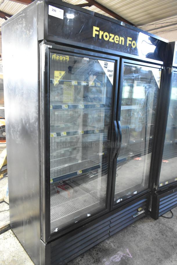2019 True GDM-49F-HC Commercial 2 Door Freezer. Black exterior, glass doors, shelves visible, "Frozen Food" sign.