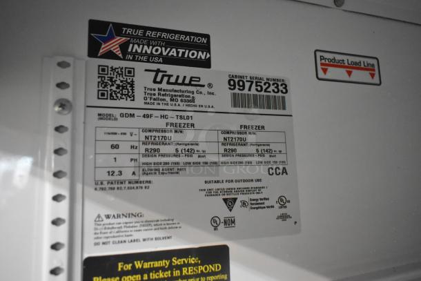 2020 True GDM-49F-HC freezer label, showing model info, voltage, refrigerant details, and serial number 9975233.