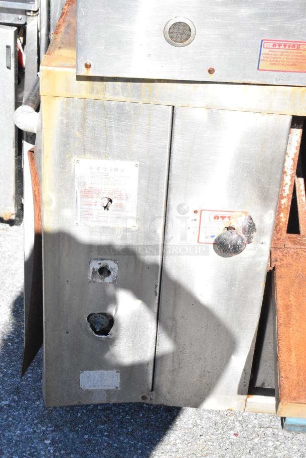 Attias 2 JS 6-18 commercial gas pizza oven, single deck, 200,000 BTU. Visible rust and wear, labels intact.