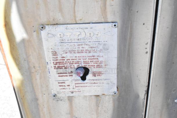 Attias 2 JS 6-18 commercial pizza oven, label with instructions and branding visible, uses gas, 200,000 BTU.