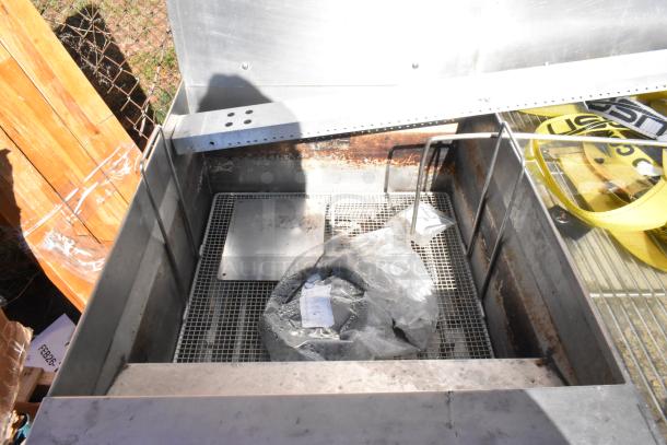 Giles EOF-24 stainless steel commercial electric 3 bay fryer with dumping station, model shown outdoors, clean condition.