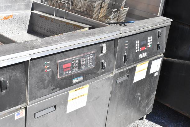 Giles EOF-24 stainless steel commercial 3 bay fryer with EOF-BIB dumping station. Features control panels and warning labels.