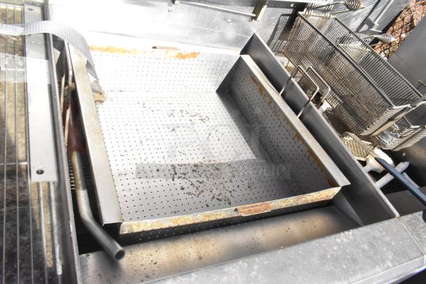 Giles EOF-24 Stainless Steel 3 Bay Fryer with EOF-BIB Dumping Station, 480V, 3 Phase. Visible wear on metal surfaces.
