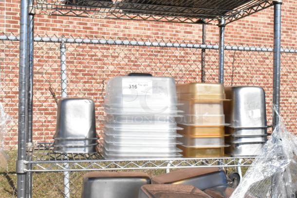 Chrome finish 4-tier wire shelving unit on casters with stainless steel drop-in bins. Includes 316 label for auction specifics.