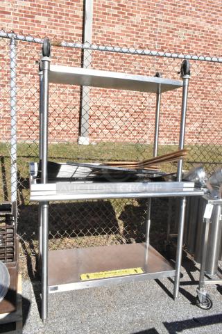 2 Commercial Table w/ Under Shelf 1 w/ Commercial Casters. 2 Times Your Bid!