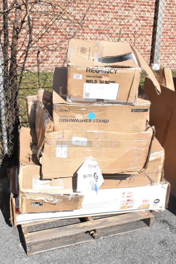 Boxes of six new scratch and dent items, including a dishwasher stand, on a pallet, with visible labels and markings.