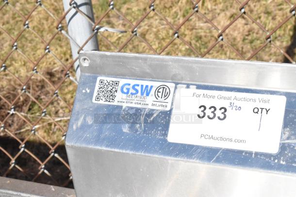 Commercial 3 bay sink with dual drain boards, GSW brand, model SEE18183D, slight wear, auction number label visible.