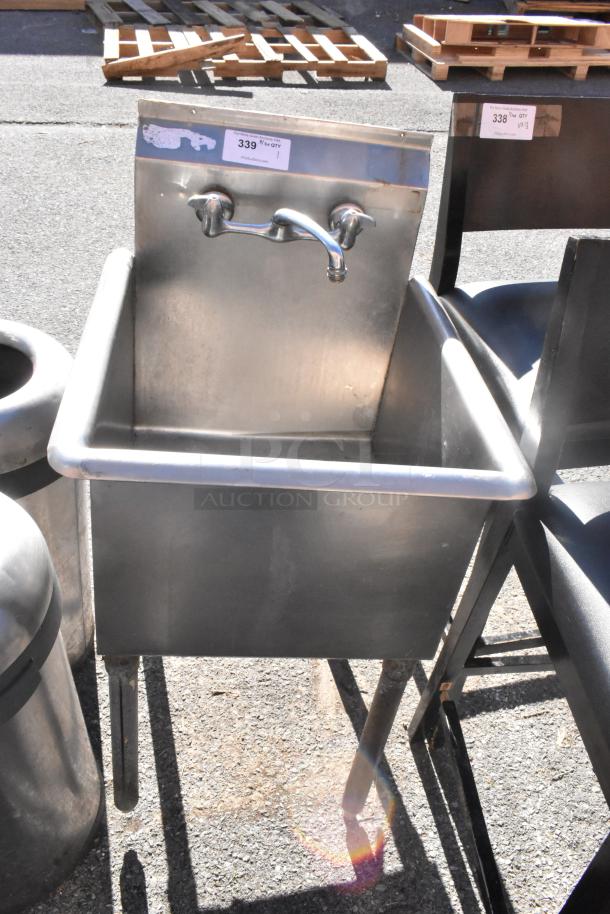 Stainless steel commercial single bay sink with wall-mounted faucet, auction tag labeled "339 Qty 1," in used condition.