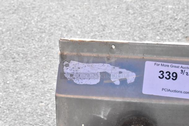 Commercial Single Bay Sink with visible wear, metal surface, and auction tag numbered 339. Suitable for industrial use.