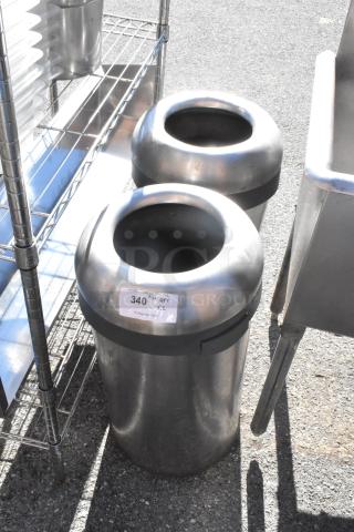 Two chrome finish trash can shells with open tops, good condition, auction tag visible, bid doubles item quantity.