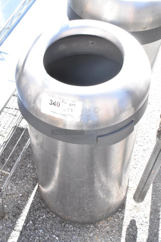 Two chrome finish trash can shells with open tops, in good condition. Includes a visible tag indicating “340” and “QTY x2.”