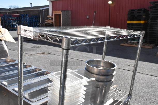 Chrome finish 3-tier wire shelving unit with contents, including bins and bowls. Buyer must dismantle. Tags indicate auction lot 341.
