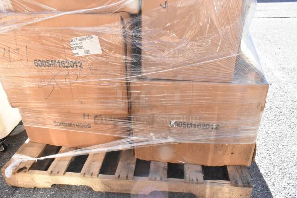Pallet of seven boxed scratch-and-dent sinks, wrapped in plastic. Labels show item code G00SM162012.