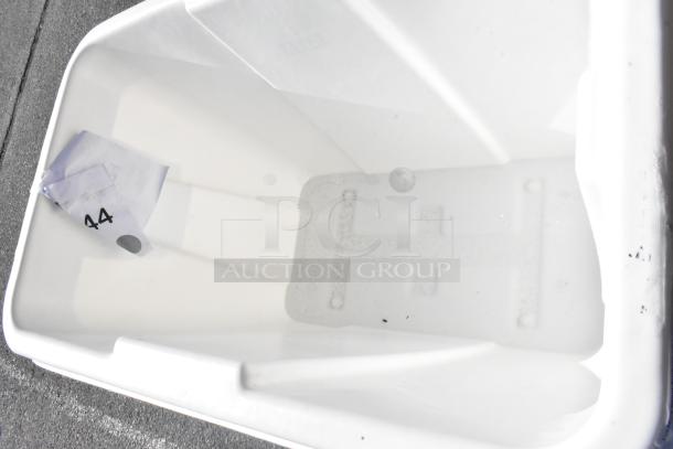 Brand new Lavex 47512RSWHTUB 12 cu. ft. cube truck, white. Visible scratches and dents on interior. Includes label with "44".