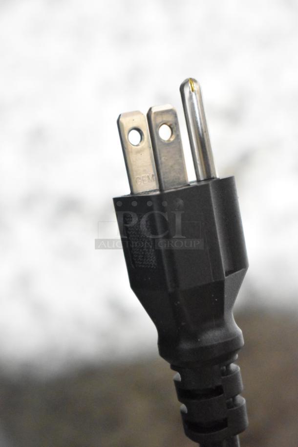 Close-up of a power plug for the Avantco 178SSUC48RHC undercounter cooler, showing standard prongs.
