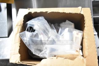 Brand new item in a damaged box with visible plastic packaging. Contents appear intact despite box wear.