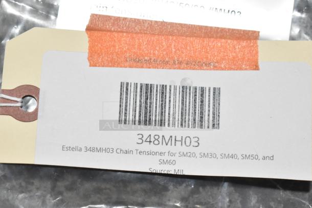 Estella 348MH03 Chain Tensioner, new condition, for SM20-60. Barcode visible on label.