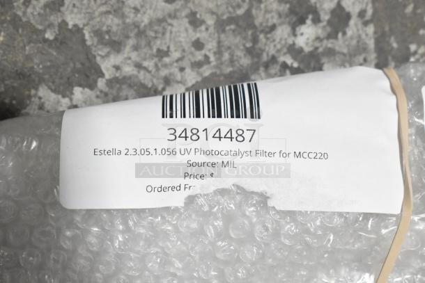 BRAND NEW Estella UV Photocatalyst Filter for MCC220, model 2.3.05.1.056, labeled with barcode 34814487. Package shows minor blemishes.