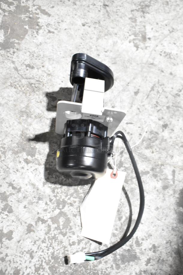 Brand new, scratch and dent item with wiring, attached tag, and mounting bracket. Black and white components.