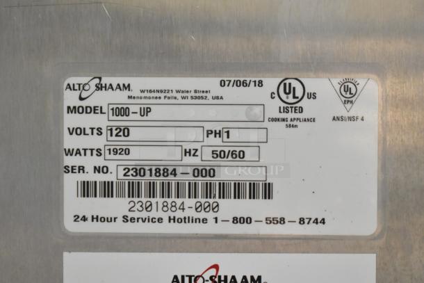 2018 Alto Shaam 1000-UP Halo Heat holding cabinet label showing model, voltage, wattage, and serial number details.