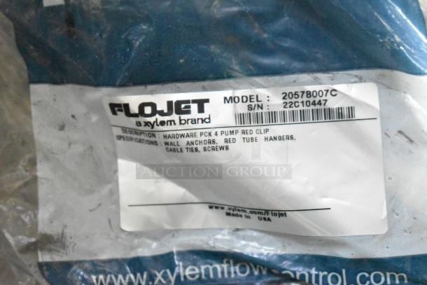 Flojet 20578007C hardware pack, includes wall anchors, red tube hangers, cable ties, and screws. New in original packaging.
