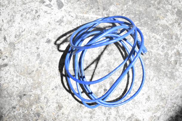 Coiled blue Ethernet cable on concrete surface, part of ALL ONE MONEY! auction lot including Flojet 20578007C hardware.