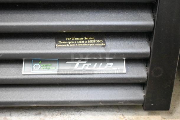 2025 True GDM-72F-HC Freezer, commercial 3-door, tested and working, features brand logo and warranty label on black panel.
