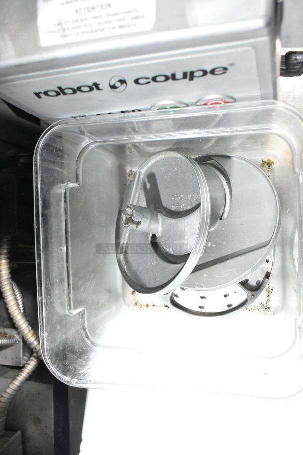 Robot Coupe CL50 Ultra food processor with 3 blades, shown in a clear container. Model CL50, 120V, 1-phase.