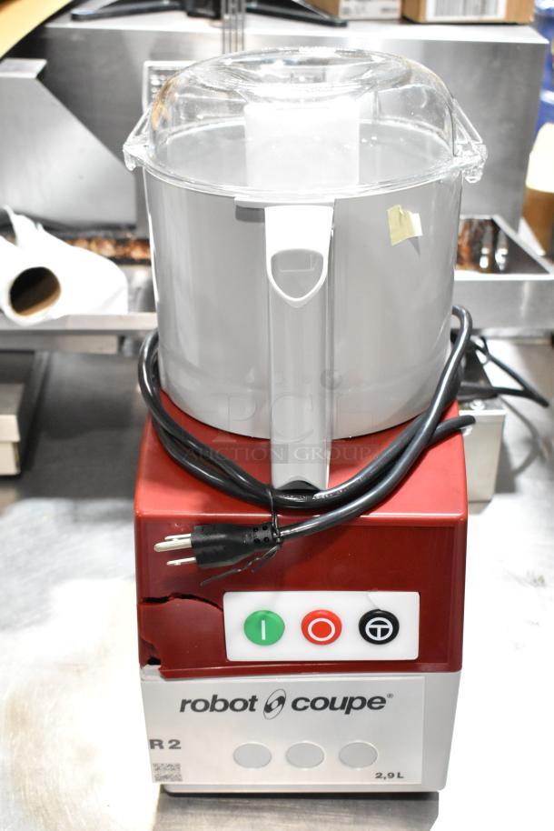 BRAND NEW SCRATCH AND DENT Robot Coupe R2N, gray bowl, 3 qt, continuous feed, 2 discs, 1 hp, 120V, minor exterior damage.