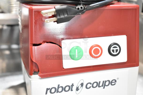 BRAND NEW SCRATCH AND DENT Robot Coupe R2N food processor, 3 Qt. gray bowl, continuous feed, 1 hp, 120V; visible damage on the casing.