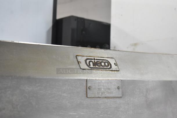 2022 Nieco FH94G propane gas commercial conveyor charbroiler. Stainless steel body, Nieco logo, caution label visible.
