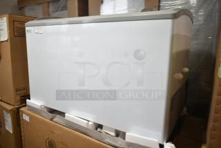 Brand new Excellence 215VB5LHC commercial freezer, 12.9 cu. ft., scratch and dent, with curved lid, 115 volts, 1 phase.