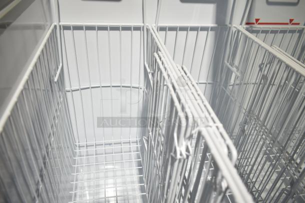 Brand new Excellence 215VB5LHC commercial freezer. Curved lid, 12.9 cu. ft., 115V, scratch and dent condition.