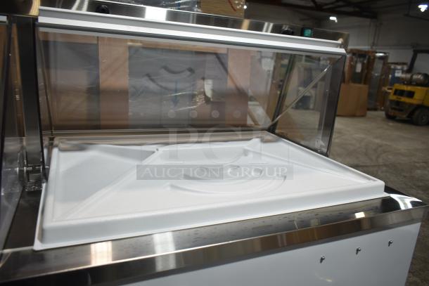 Brand new Avantco 178CPW68HC ice cream dipping cabinet; 12-tub capacity, scratch and dent model, 115V, 1 phase.