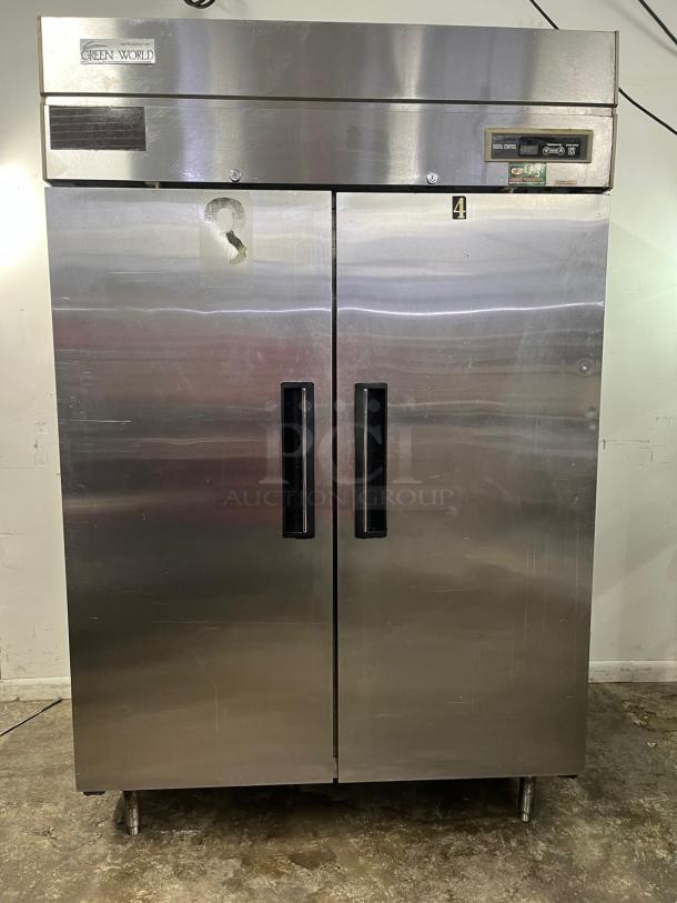 Green World Turbo Air GST-40DR commercial refrigerator, 2 solid doors, stainless steel, visible wear, model label intact.