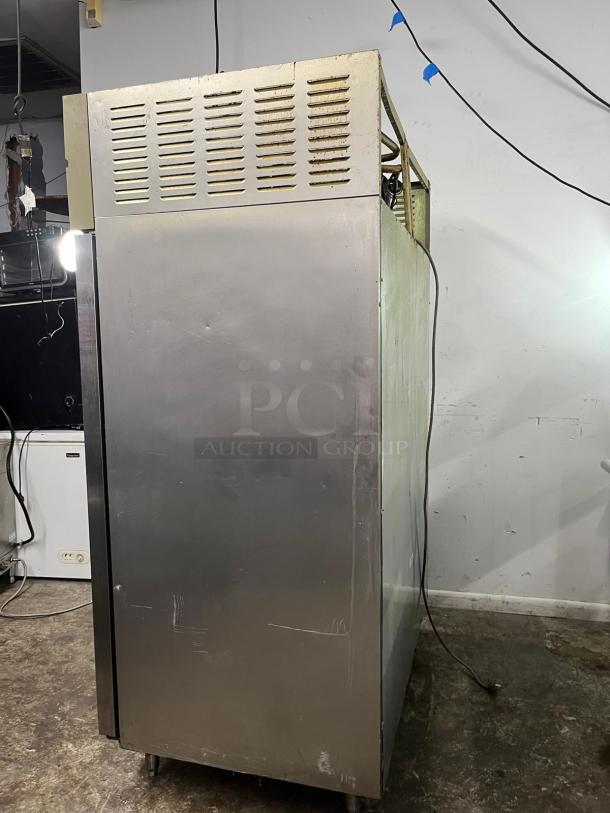 Green World GST-40DR commercial fridge, 2 solid doors, stainless steel, visible wear, used condition, Turbo Air model.