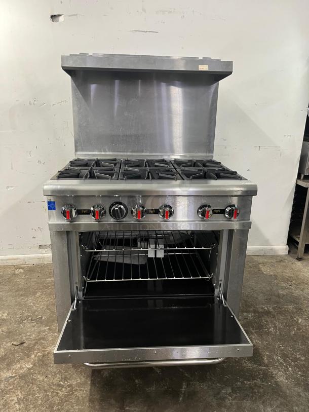 Brand new Omcan 43151 36-inch gas range with 6 open burners, 211000 BTU, stainless steel, commercial-grade.
