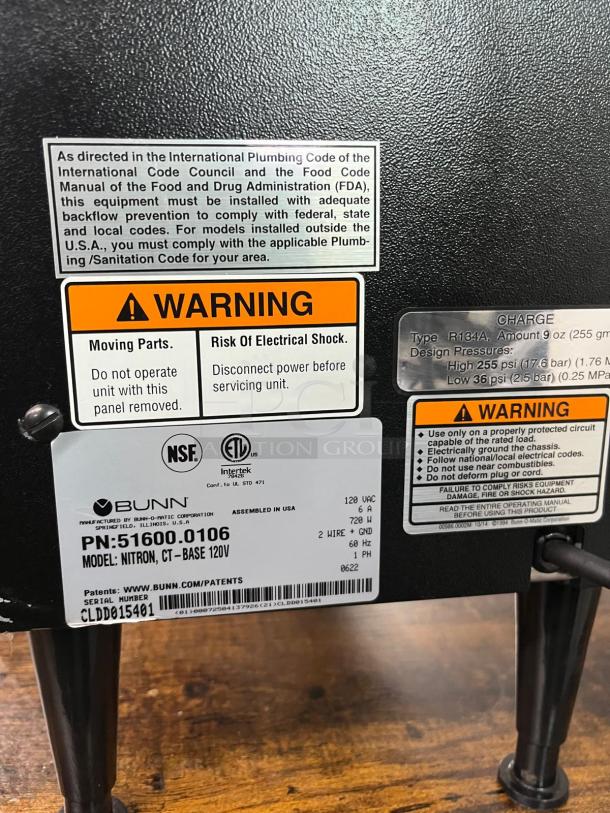 Bunn 51600.0106 Nitron CT-Base cold brew coffee dispenser, 2-gallon, with warning and compliance labels, countertop model.