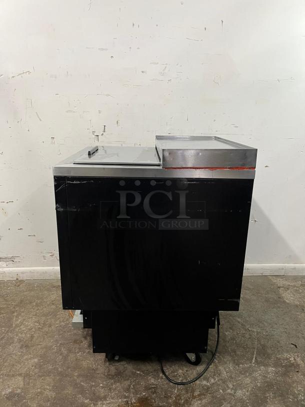 COMMERCIAL GRADE BEVERAGE-AIR GF24L-B underbar glass froster in black, steel top, used condition, ideal for bar settings.