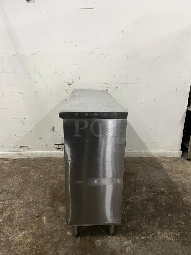 YUKON 120-YDC1548418 stainless steel storage dish cabinet with open front, showing side view. Good condition.