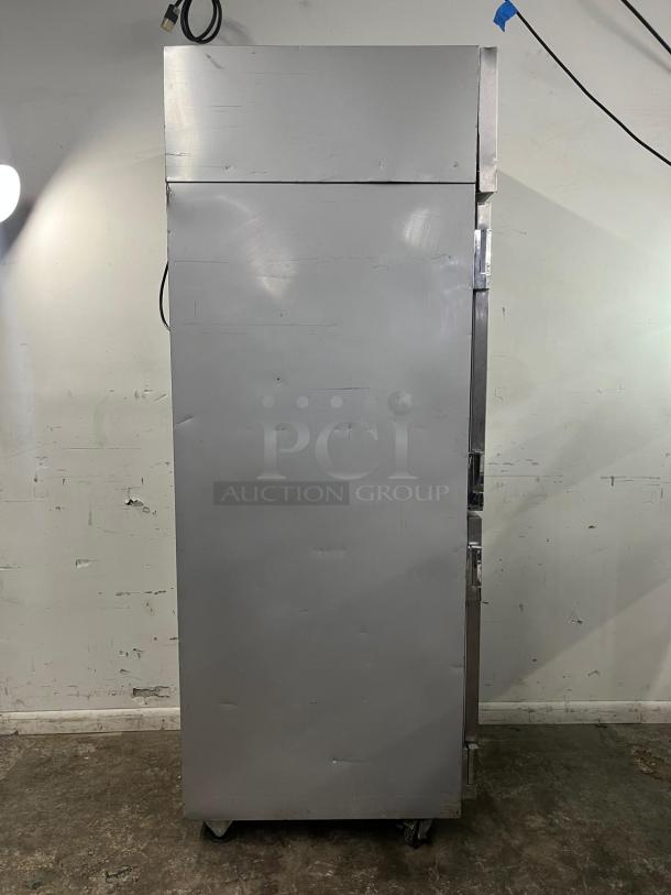 Beverage-Air HF1HC-1HS reach-in freezer, 26" wide, two right hinge solid doors, stainless steel, visible wear, on casters.