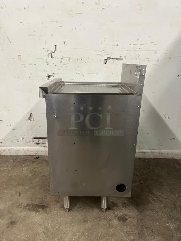 Perlick SC24-18 24" stainless steel storage cabinet with open base, shelves, and visible labels. Good condition.