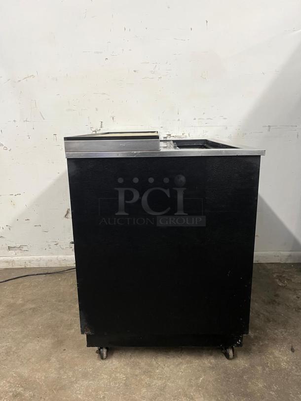 TRUE T-36-GC-HC glass froster/plate chiller, black finish, 36 3/4", good condition, features caster wheels.