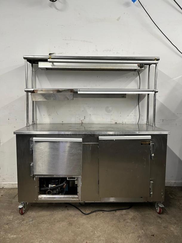 LEADER LB48 48" low boy under counter refrigerator with two full and one half door, double shelves, heat lamp; signs of wear.
