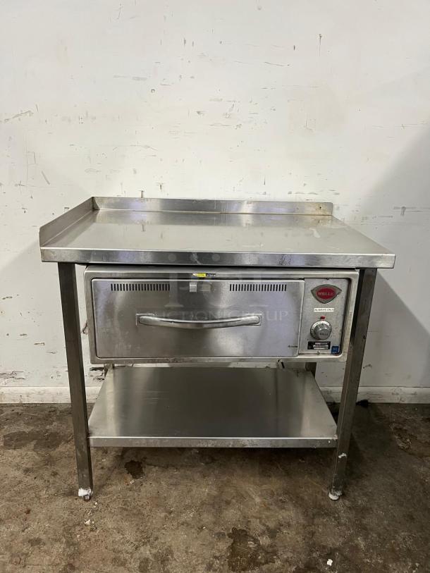 WELLS RW-1HD freestanding warming drawer, 29.25"W with 21.5" compartment, stainless steel, visible control panel, used condition.