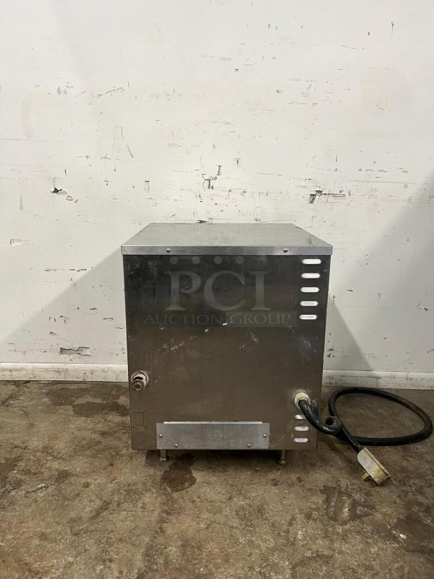 Late model 2023 GROEN XS-208-12 countertop convection steamer, stainless steel, with visible power cord, in used condition.